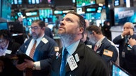 Dow hits record, joining S&P 500, Nasdaq