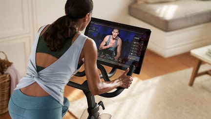 Peloton reports wider loss than expected, slashes price of bike again