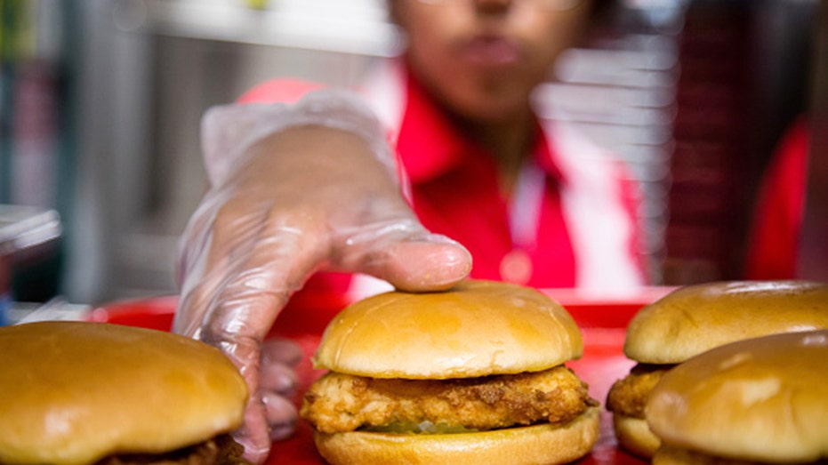 Chick-fil-A worker grabs sandwich