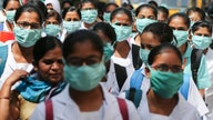 As virus outbreaks multiply, UN declines to declare pandemic