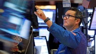 Dow futures tumble 1,000 points after Fed takes emergency action