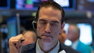 Stock futures trade lower despite stimulus measures