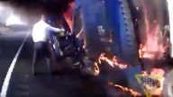 New Jersey troopers rescue trucker seconds before rig explodes