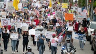 NC governor threatens ban on large crowds, county says he left them in dark about speedway event