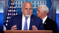 Who is CDC Director Dr. Robert Redfield?