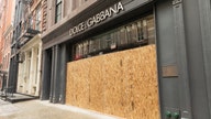 Businesses protect themselves from coronavirus-spurned civil unrest by boarding up storefronts