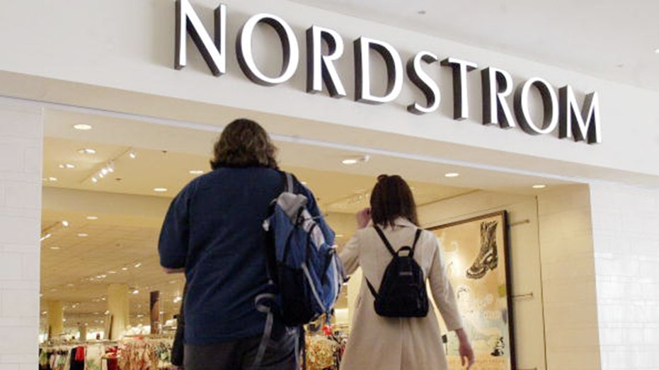 Shoppers enter a Nordstrom