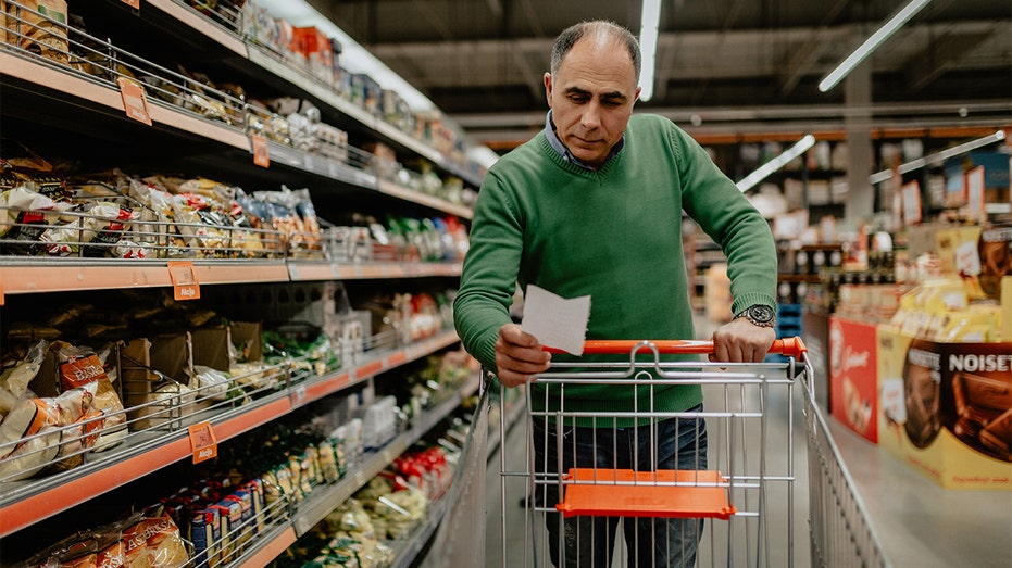 Man holds shopping list