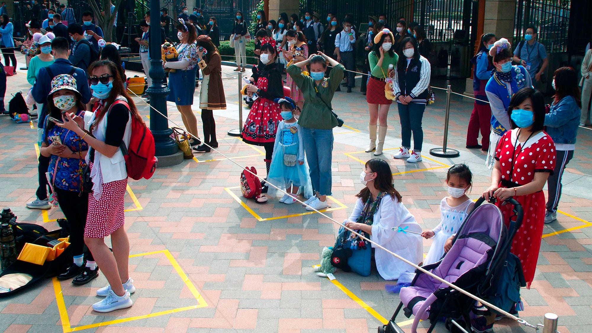 Shanghai Disneyland reopens with anti-coronavirus controls | Fox ...