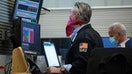 Dow jumps 477 points as stocks rebound but still post weekly drop