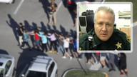 Fired Florida sheriff who hid in car during Parkland shooting reinstated