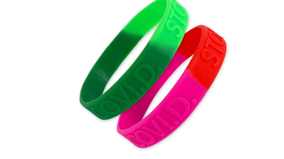 green rubber bracelet meaning
