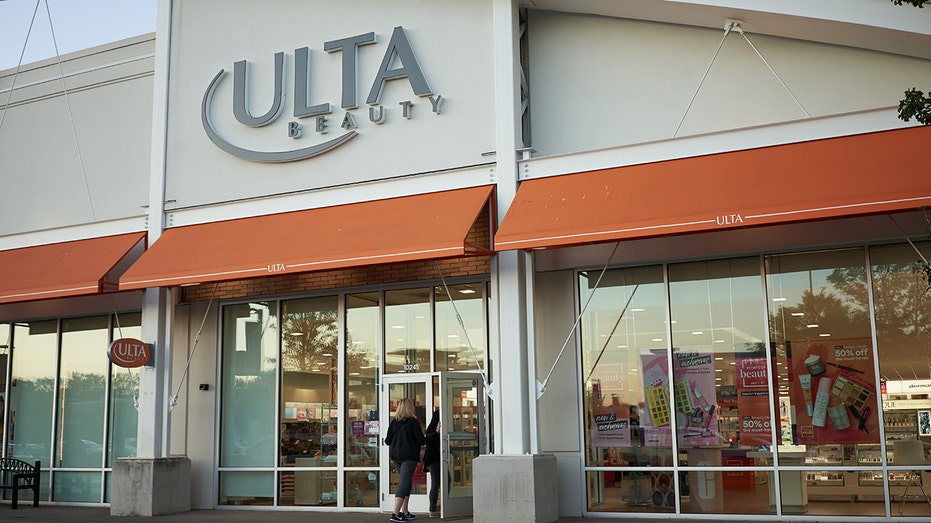 Portland, Oregon, USA - Sep 21, 2019: A shopping entering the Ulta Beauty Store in Portland's Cascade Station Shopping Center at dusk. Ulta Beauty, Inc., is an America chain of beauty stores headquartered in Bolingbrook, IL.