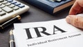 Documents about Individual retirement account IRA on a desk. - Fox News