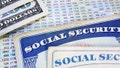 Social Security cards with cash and benefit amount numbers - Fox News