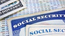 Social Security cards with cash and benefit amount numbers - Fox Business News