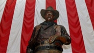 Democrats want John Wayne's name, statue taken off airport