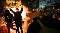 Unrest overshadows peaceful US protests for another night