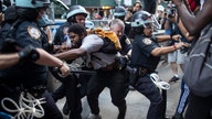 Day of peaceful NYC marches gives way to chaos after dark