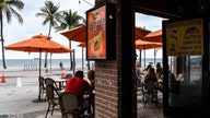 Florida bans alcohol at bars as coronavirus cases spike