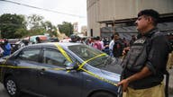 Gunmen attack Pakistani stock exchange, six killed: police