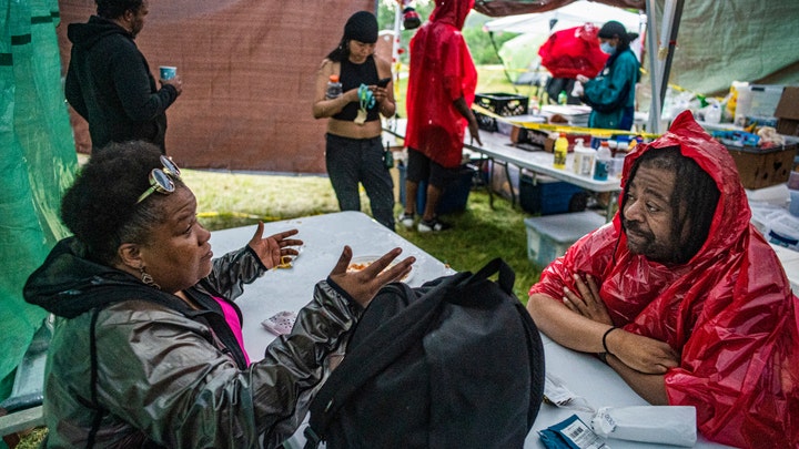 City allows homeless to camp in parks after abandoned hotel evicts hundreds