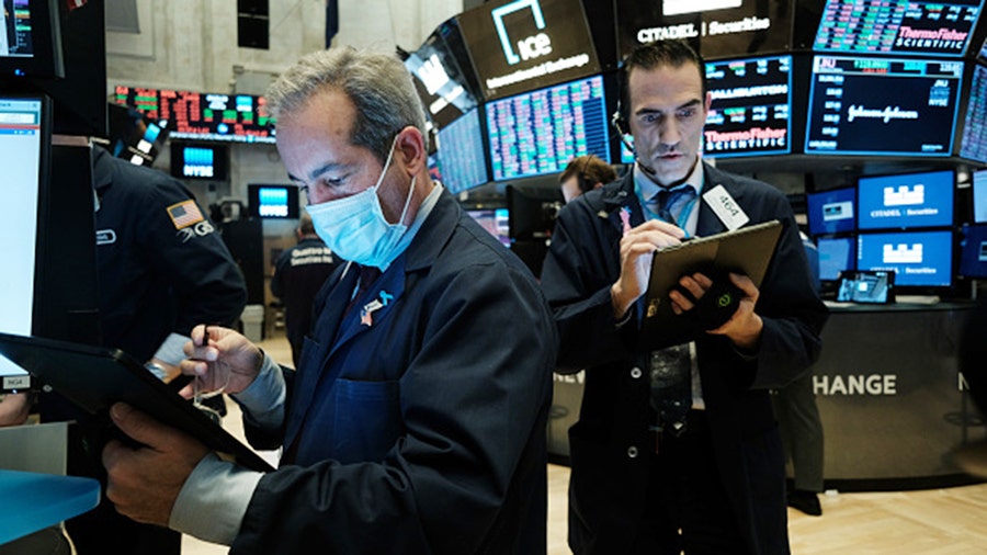 Stocks turn lower as coronavirus resurgence causes Apple to shutter some stores