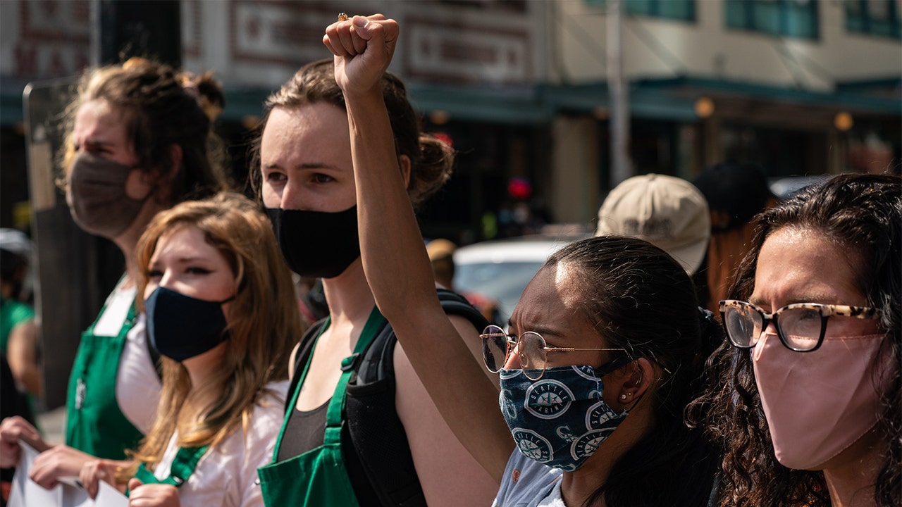 Protesters rally against Starbucks over company's Seattle police ties ...