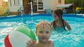 Children swimming in pool in summer evening - Fox News