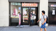 Doughnut-maker marks 50 years in shop she now owns