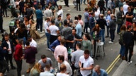 England pubs reopen to large crowds, sparking some coronavirus concerns