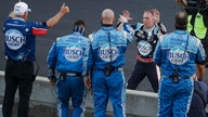 Harvick takes advantage of Hamlin's crash to win Brickyard