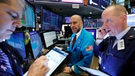 Stock futures trade lower as banks report earnings