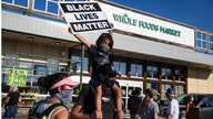 Portland Whole Foods workers walk out after employee says he lost job over anti-racism button