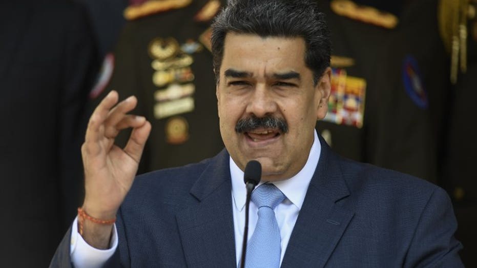 enezuelan President Nicolas Maduro speaks during a press conference at the Miraflores Presidential Palace in Caracas, Venezuela