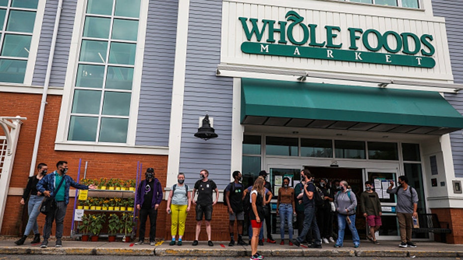 Protesters outside of Whole Foods in Cambridge