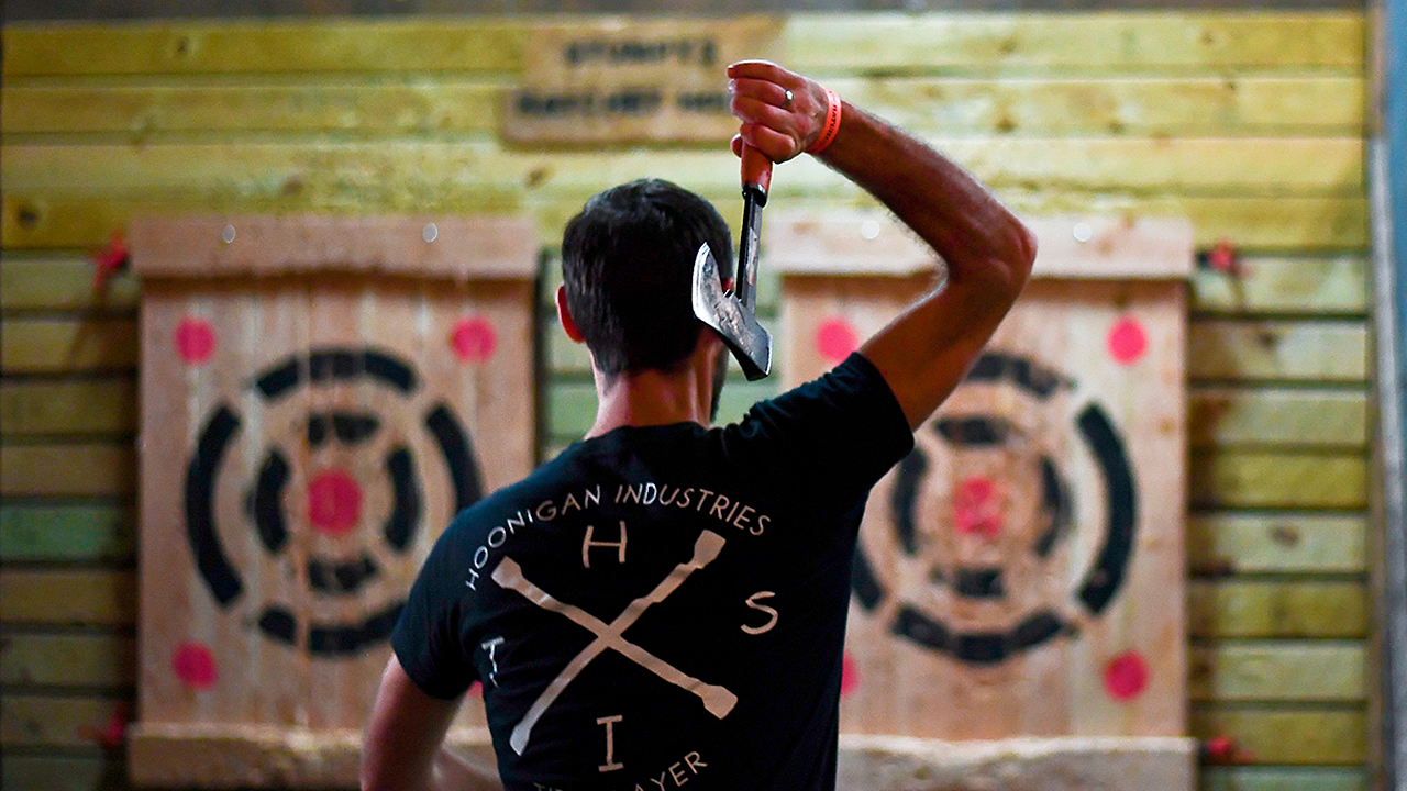 Stressed-out Americans seek out axe throwing, shooting ranges.