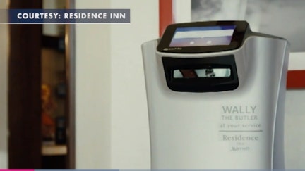 Social distancing robot delivering items to hotel guests