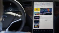 Tesla charging up to develop its own in-vehicle video games