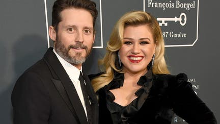 Kelly Clarkson (right) with Brandon Blackstock, son of Narvel Blackstock, who runs Starstruck Management Group. Clarkson filed for divorce from Brandon earlier this year.