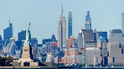  A view of the Manhattan skyline with the Statue of Liberty and the Empire State Building from the Tear Drop 9/11 Memorial during the fourth phase of reopening on August 30, 2020 in Bayonne, New Jersey. The fourth phase allows outdoor arts and entertainment, sporting events without fans and media production. (Photo by Roy Rochlin/Getty Images) - Fox Business News