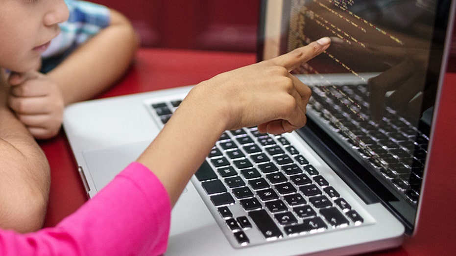 students at laptop