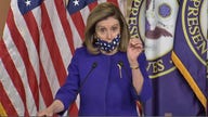 Pelosi says coronavirus relief could be attached to government spending bill