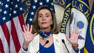 Pelosi pledges 'imminent' relief for US airlines, urges industry to delay thousands of furloughs