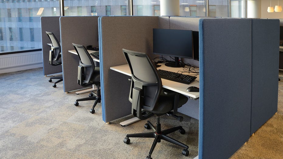 An empty row of cubicles in an office