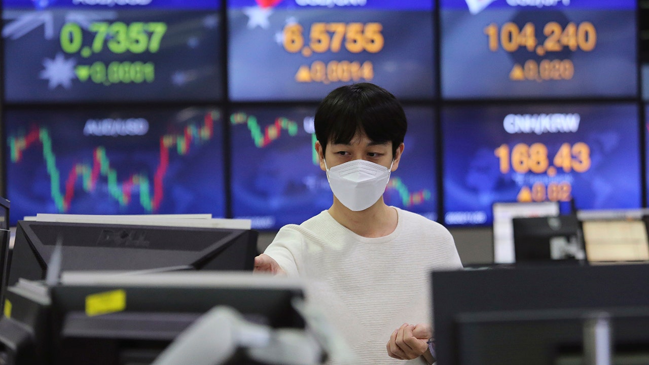 US stock futures trade slightly higher early Friday as ...