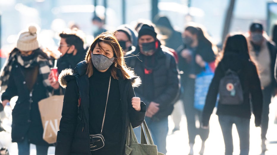New York City shoppers wearing masks on 5th Avenue