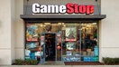 File photo of a GameStop video game store entrance fa&ccedil;ade in strip mall with sign, photographed in San Jose, California.