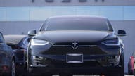 Tesla posts first profitable year after sixth straight quarter of gains