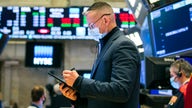 Stock futures trade lower ahead of Powell comments